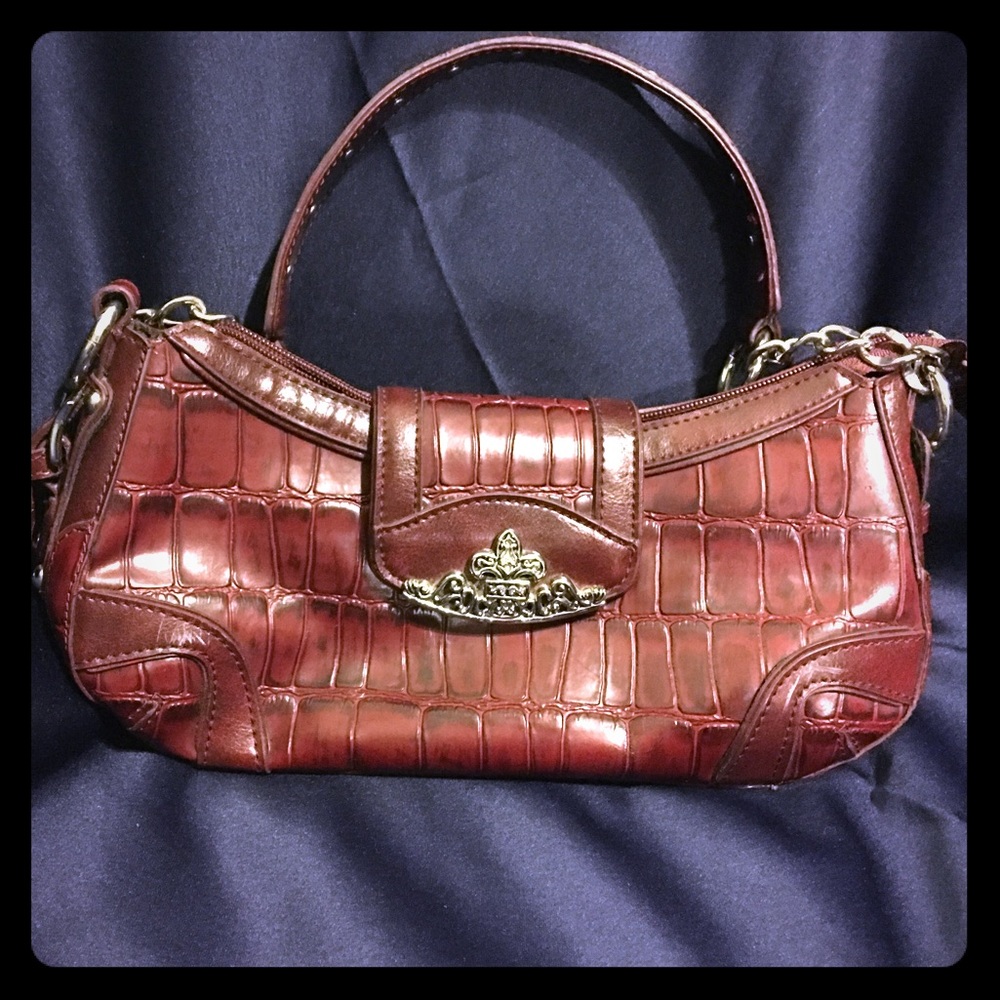 M.C. Marc Chantal red leather purse
